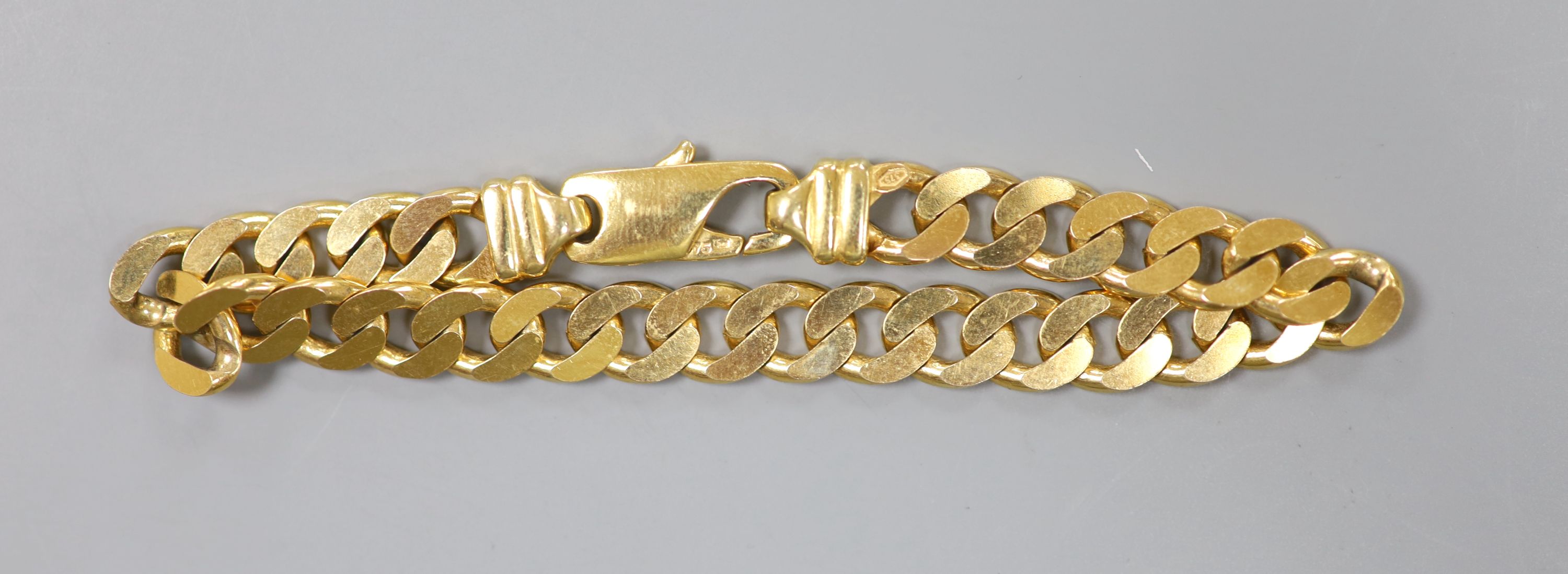 A 9ct gold curb-link bracelet with trigger clasp, 25.8g